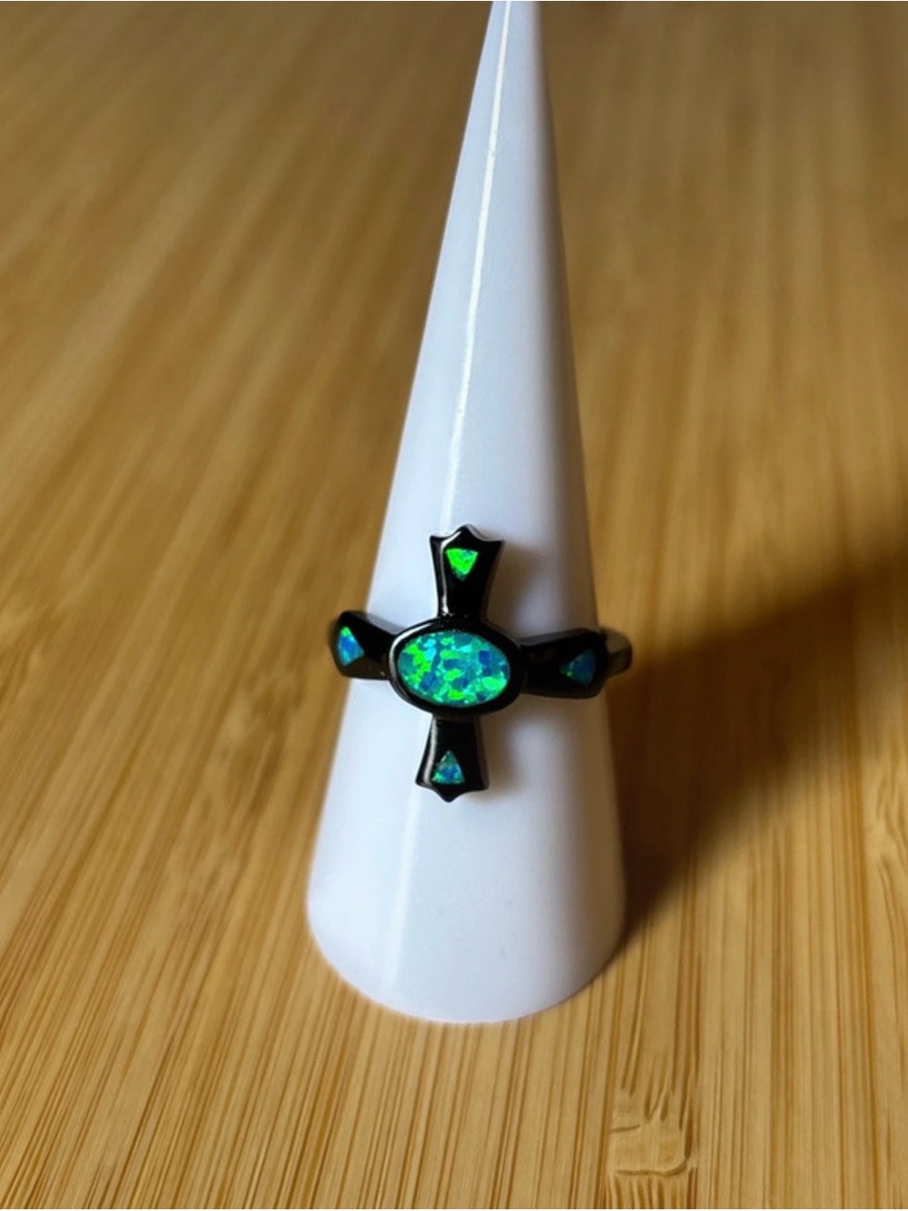 Black Ring with Iridescent Green Opal Cross Accent
